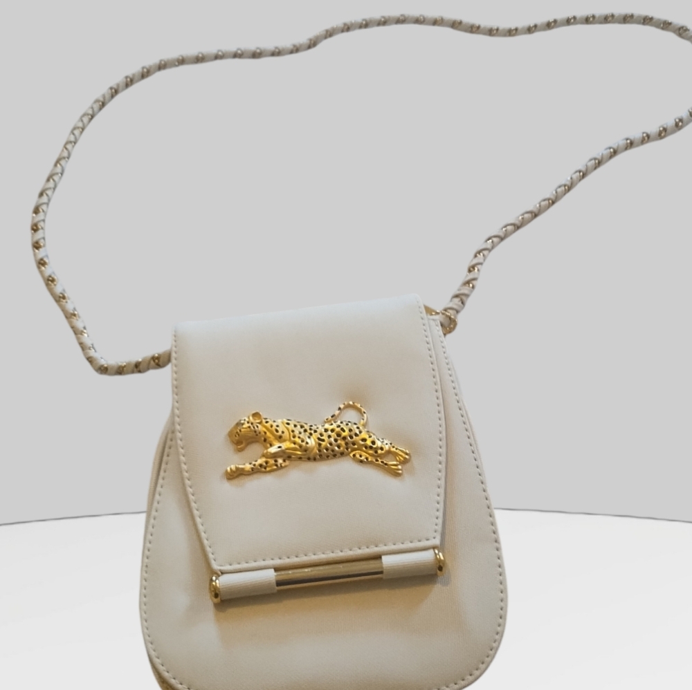 NIMA vintage cheetah bag.. cream and gold with gold cream leather straps to the
